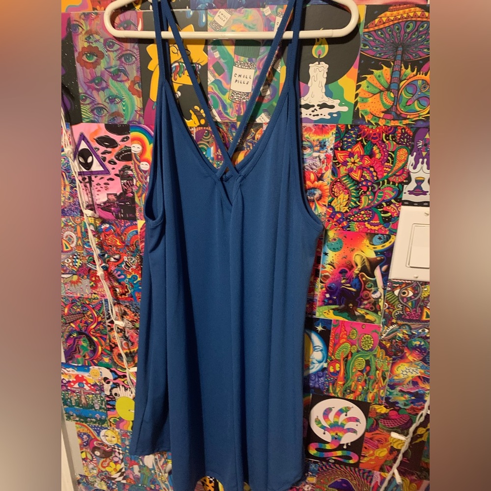 it is a large shirt but could be worn as a cute dress